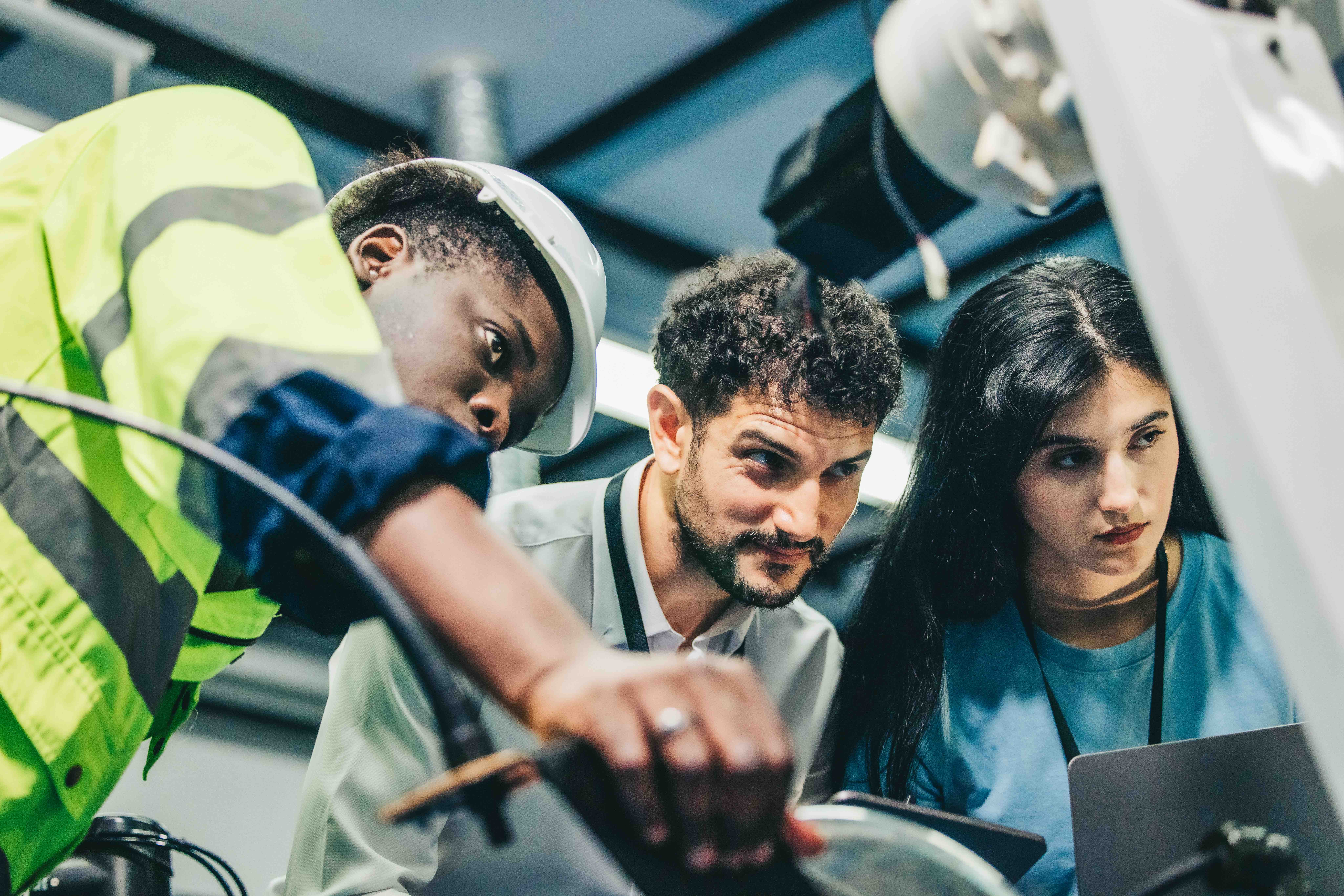 robotic--engineer-and-team-oversee-software-machin-2024-04-03-18-18-52-utc